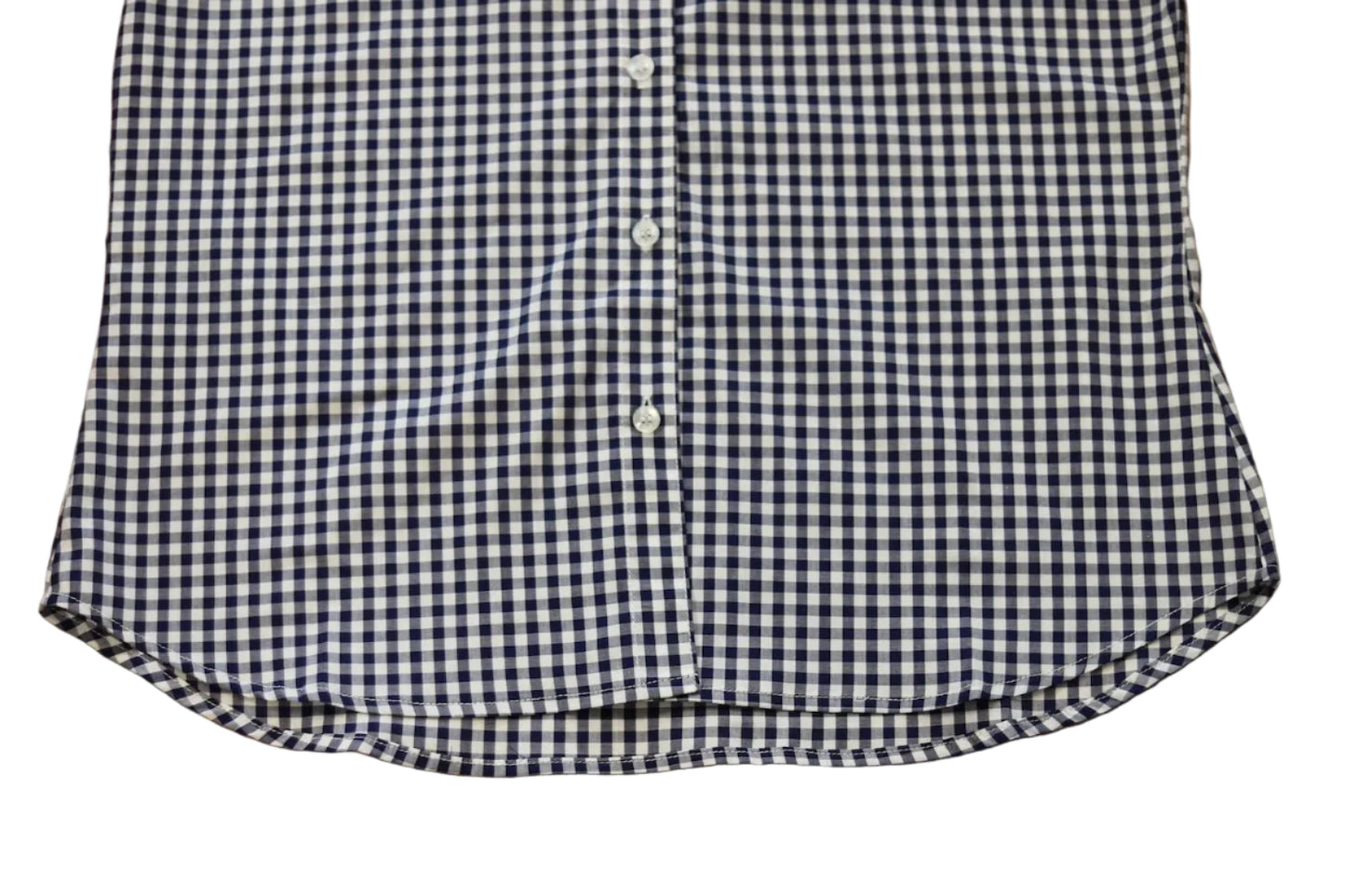short sleeve close up of sleeve of women's navy blue gingham bottom