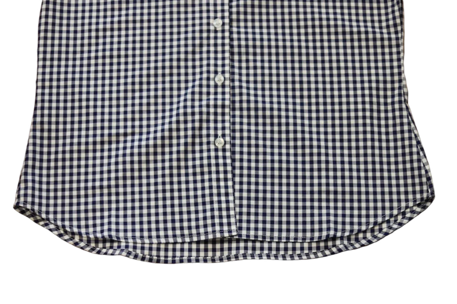 short sleeve close up of sleeve of women's navy blue gingham bottom