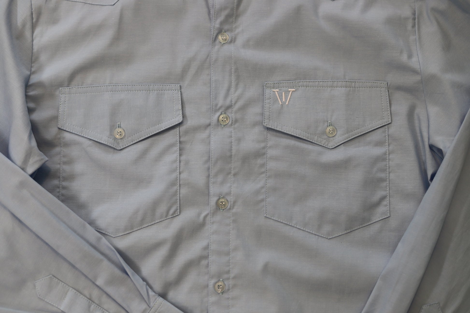 classic mens chambray button down front pockets and logo